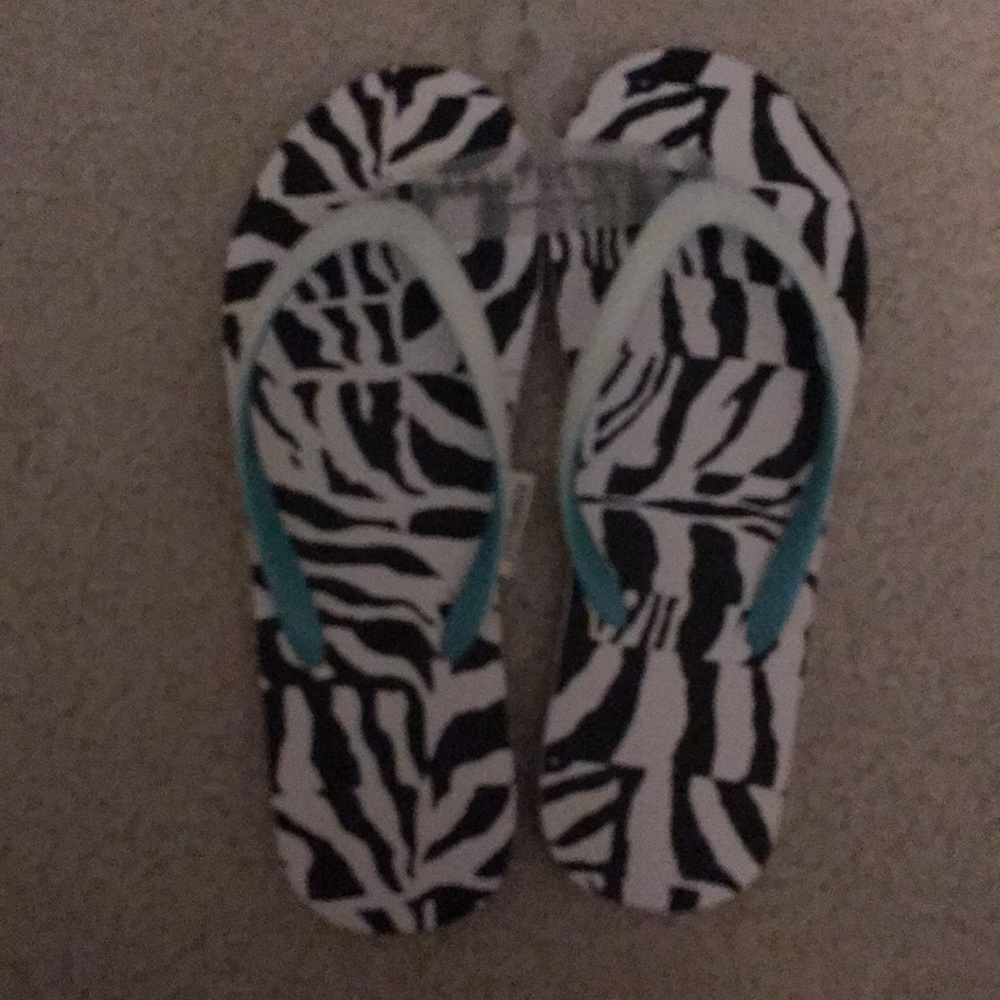 Black and white flip flops